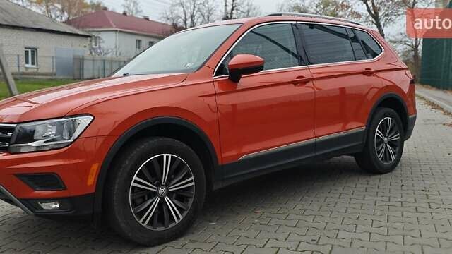 Оранжевый Фольксваген Тигуан, объемом двигателя 1.98 л и пробегом 148 тыс. км за 16200 $, фото 2 на Automoto.ua