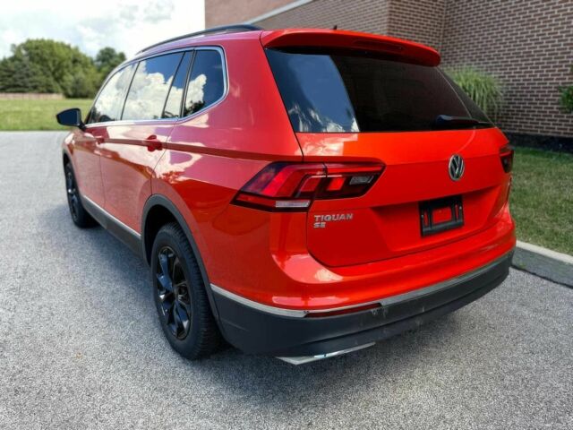 Помаранчевий Фольксваген Тігуан, об'ємом двигуна 2 л та пробігом 31 тис. км за 9000 $, фото 4 на Automoto.ua