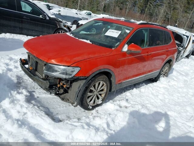 Помаранчевий Фольксваген Тігуан, об'ємом двигуна 2 л та пробігом 185 тис. км за 12150 $, фото 2 на Automoto.ua