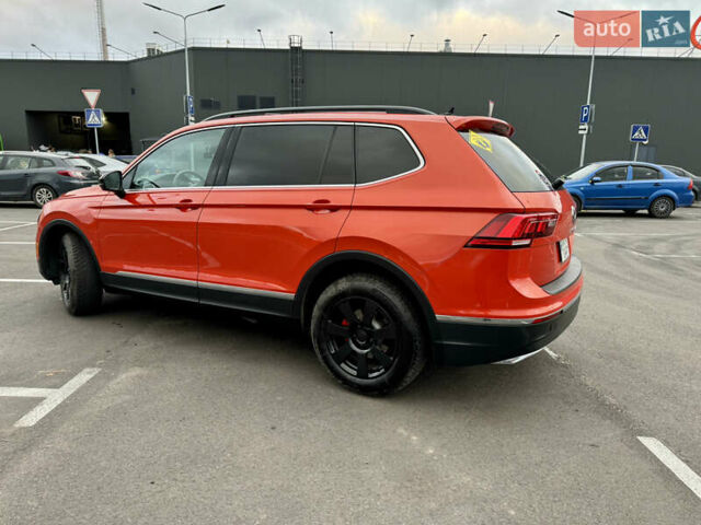 Помаранчевий Фольксваген Тігуан, об'ємом двигуна 1.98 л та пробігом 176 тис. км за 16690 $, фото 4 на Automoto.ua