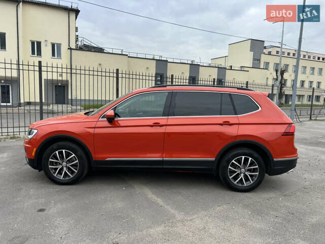 Помаранчевий Фольксваген Тігуан, об'ємом двигуна 1.98 л та пробігом 58 тис. км за 18900 $, фото 3 на Automoto.ua