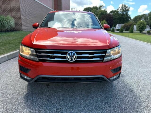 Помаранчевий Фольксваген Тігуан, об'ємом двигуна 2 л та пробігом 31 тис. км за 9000 $, фото 1 на Automoto.ua