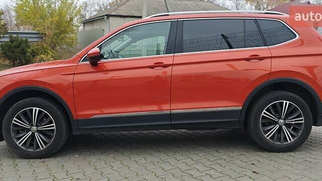 Оранжевый Фольксваген Тигуан, объемом двигателя 1.98 л и пробегом 148 тыс. км за 16200 $, фото 4 на Automoto.ua