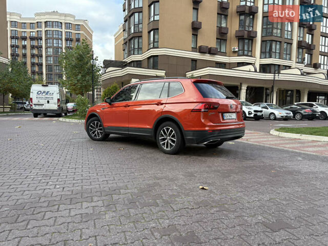 Помаранчевий Фольксваген Тігуан, об'ємом двигуна 1.98 л та пробігом 187 тис. км за 17700 $, фото 2 на Automoto.ua