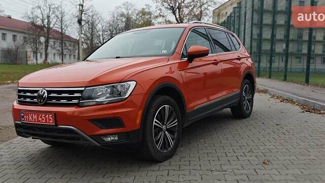 Оранжевый Фольксваген Тигуан, объемом двигателя 1.98 л и пробегом 148 тыс. км за 16200 $, фото 1 на Automoto.ua