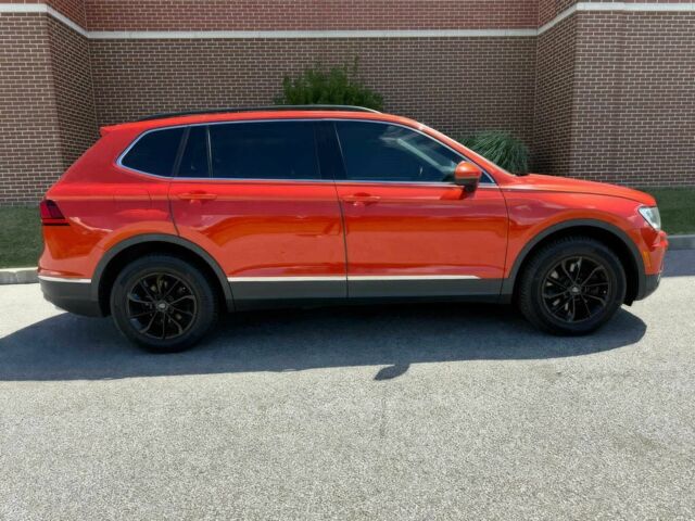 Помаранчевий Фольксваген Тігуан, об'ємом двигуна 2 л та пробігом 31 тис. км за 9000 $, фото 7 на Automoto.ua