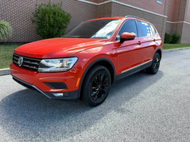 Помаранчевий Фольксваген Тігуан, об'ємом двигуна 2 л та пробігом 31 тис. км за 9000 $, фото 2 на Automoto.ua