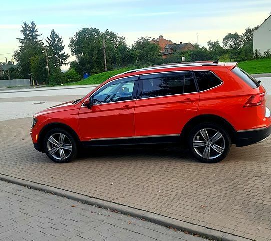 Помаранчевий Фольксваген Тігуан, об'ємом двигуна 2 л та пробігом 100 тис. км за 24500 $, фото 2 на Automoto.ua