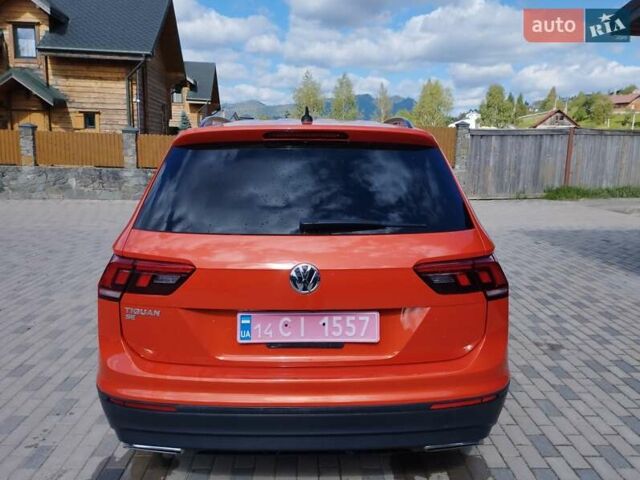 Помаранчевий Фольксваген Тігуан, об'ємом двигуна 1.98 л та пробігом 104 тис. км за 16200 $, фото 9 на Automoto.ua