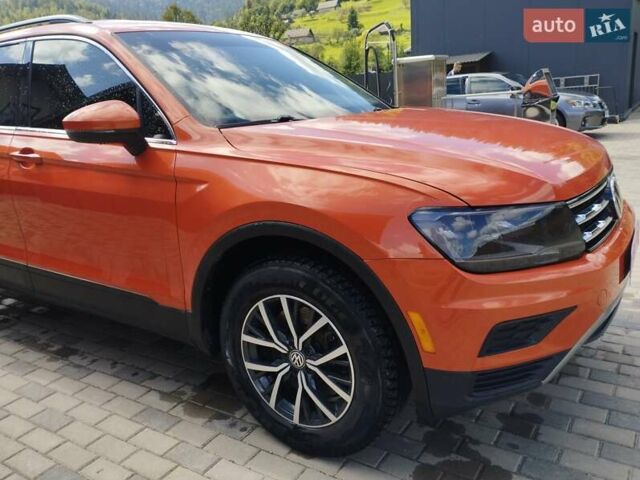 Помаранчевий Фольксваген Тігуан, об'ємом двигуна 1.98 л та пробігом 104 тис. км за 16200 $, фото 5 на Automoto.ua