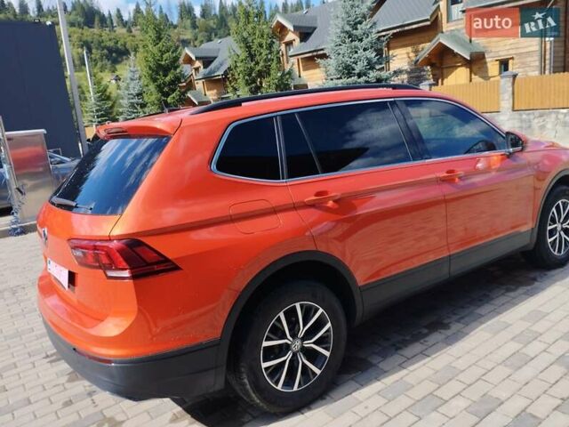 Помаранчевий Фольксваген Тігуан, об'ємом двигуна 1.98 л та пробігом 104 тис. км за 16200 $, фото 4 на Automoto.ua