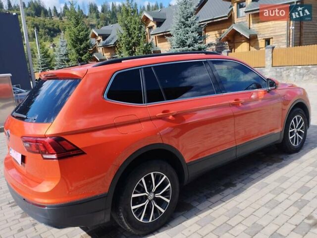 Помаранчевий Фольксваген Тігуан, об'ємом двигуна 1.98 л та пробігом 104 тис. км за 16200 $, фото 3 на Automoto.ua