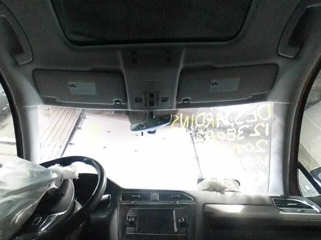 Оранжевый Фольксваген Тигуан, объемом двигателя 2 л и пробегом 115 тыс. км за 11500 $, фото 4 на Automoto.ua