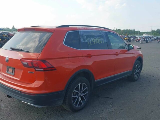 Оранжевый Фольксваген Тигуан, объемом двигателя 2 л и пробегом 115 тыс. км за 11500 $, фото 2 на Automoto.ua