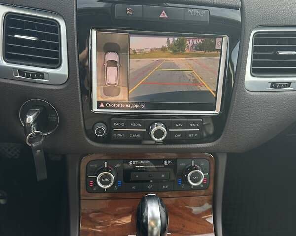 Белый Фольксваген Туарег, объемом двигателя 2.97 л и пробегом 260 тыс. км за 19200 $, фото 32 на Automoto.ua