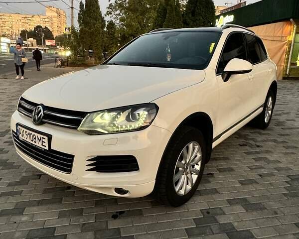 Білий Фольксваген Туарег, об'ємом двигуна 4.13 л та пробігом 195 тис. км за 26500 $, фото 12 на Automoto.ua