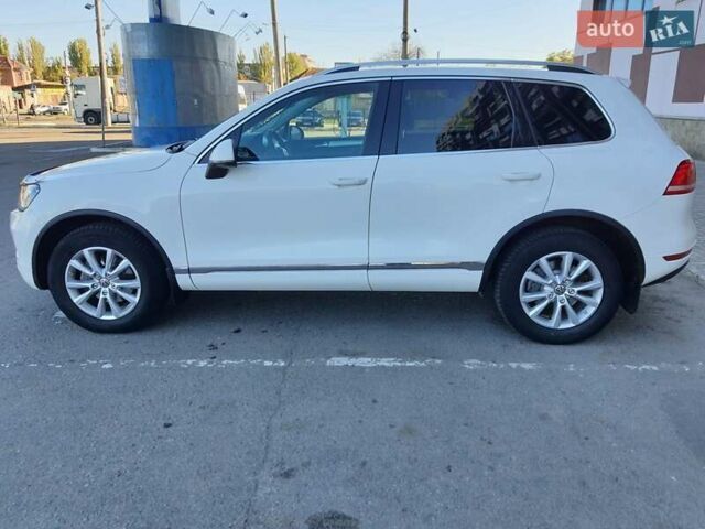 Белый Фольксваген Туарег, объемом двигателя 2.97 л и пробегом 411 тыс. км за 16000 $, фото 4 на Automoto.ua