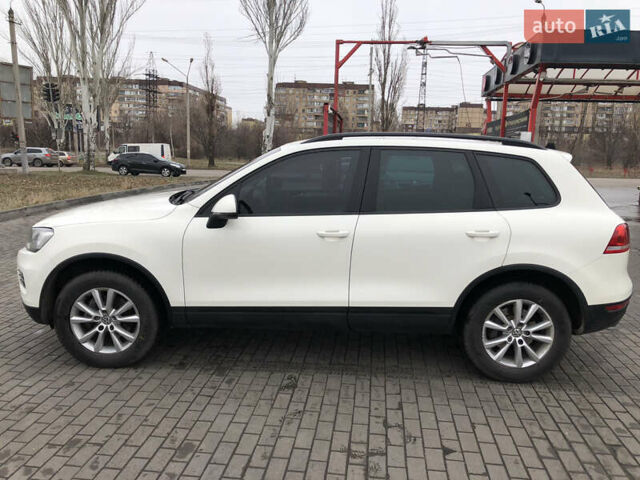 Белый Фольксваген Туарег, объемом двигателя 2.97 л и пробегом 303 тыс. км за 16700 $, фото 1 на Automoto.ua