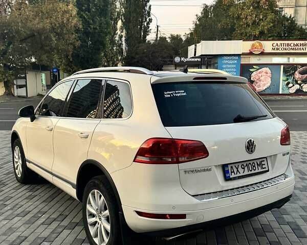 Білий Фольксваген Туарег, об'ємом двигуна 4.13 л та пробігом 195 тис. км за 26500 $, фото 11 на Automoto.ua
