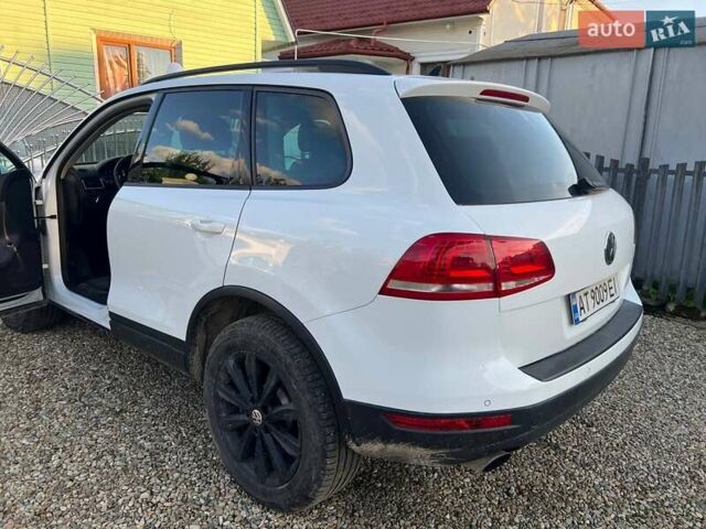 Білий Фольксваген Туарег, об'ємом двигуна 2.97 л та пробігом 337 тис. км за 18500 $, фото 14 на Automoto.ua