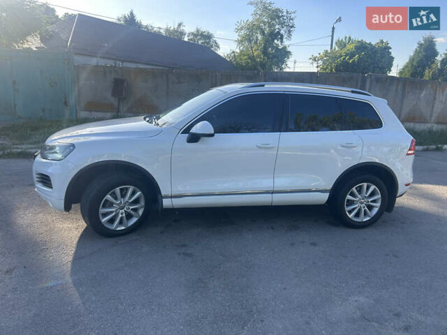Белый Фольксваген Туарег, объемом двигателя 2.97 л и пробегом 245 тыс. км за 20000 $, фото 2 на Automoto.ua