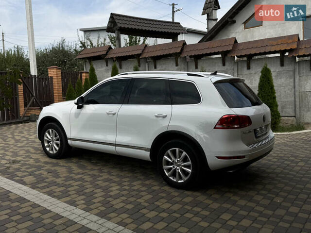 Білий Фольксваген Туарег, об'ємом двигуна 3 л та пробігом 202 тис. км за 18600 $, фото 4 на Automoto.ua