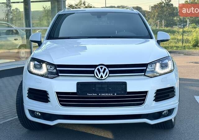 Белый Фольксваген Туарег, объемом двигателя 4.13 л и пробегом 128 тыс. км за 29000 $, фото 2 на Automoto.ua