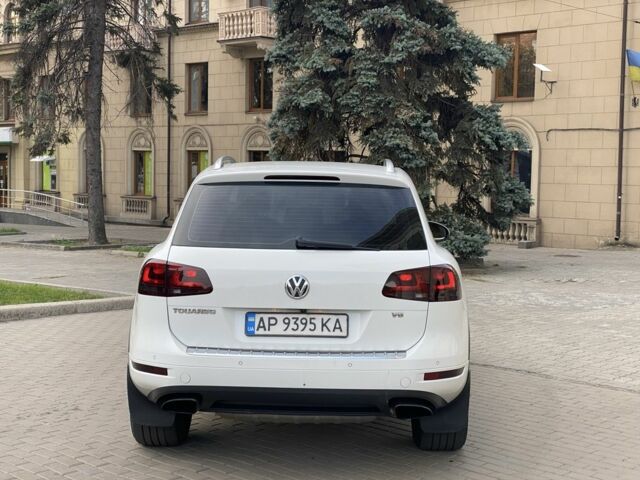 Білий Фольксваген Туарег, об'ємом двигуна 3 л та пробігом 235 тис. км за 14800 $, фото 7 на Automoto.ua