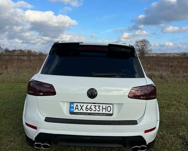 Белый Фольксваген Туарег, объемом двигателя 2.97 л и пробегом 226 тыс. км за 18888 $, фото 11 на Automoto.ua