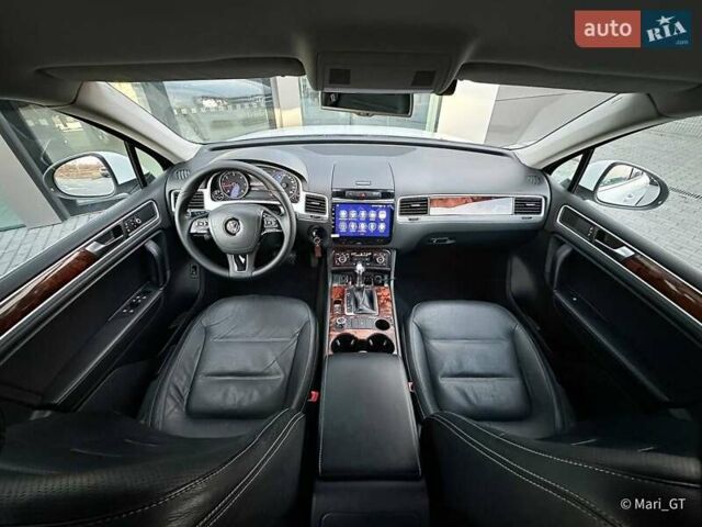 Білий Фольксваген Туарег, об'ємом двигуна 3 л та пробігом 239 тис. км за 19300 $, фото 40 на Automoto.ua