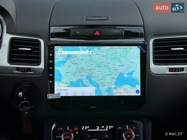 Білий Фольксваген Туарег, об'ємом двигуна 3 л та пробігом 239 тис. км за 19300 $, фото 39 на Automoto.ua