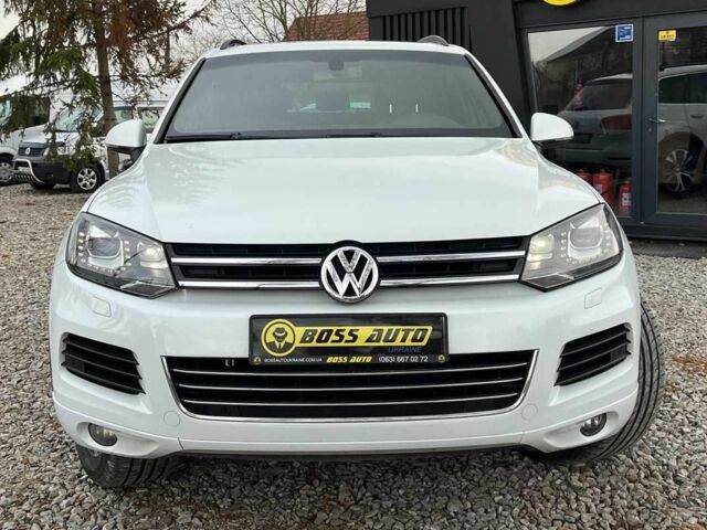 Белый Фольксваген Туарег, объемом двигателя 3 л и пробегом 214 тыс. км за 18999 $, фото 1 на Automoto.ua