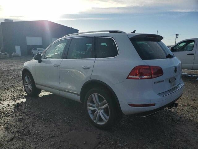 Білий Фольксваген Туарег, об'ємом двигуна 3 л та пробігом 151 тис. км за 1900 $, фото 1 на Automoto.ua