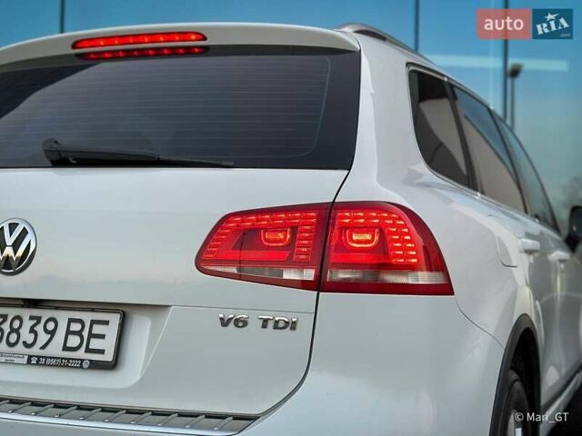 Білий Фольксваген Туарег, об'ємом двигуна 3 л та пробігом 239 тис. км за 19300 $, фото 17 на Automoto.ua