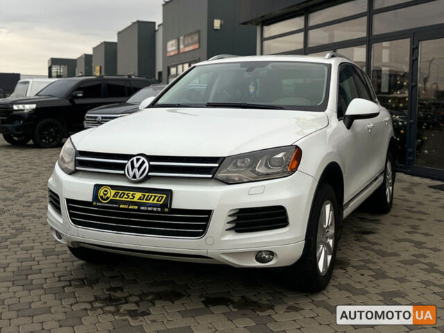 Білий Фольксваген Туарег, об'ємом двигуна 3 л та пробігом 283 тис. км за 20800 $, фото 2 на Automoto.ua