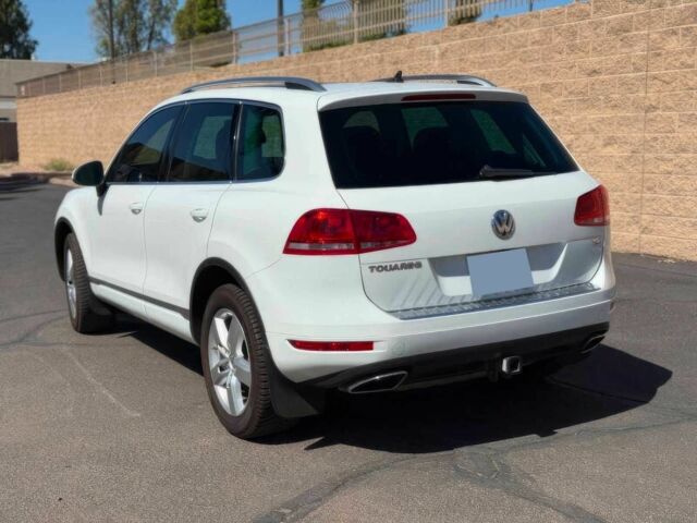 Белый Фольксваген Туарег, объемом двигателя 3 л и пробегом 83 тыс. км за 10500 $, фото 5 на Automoto.ua