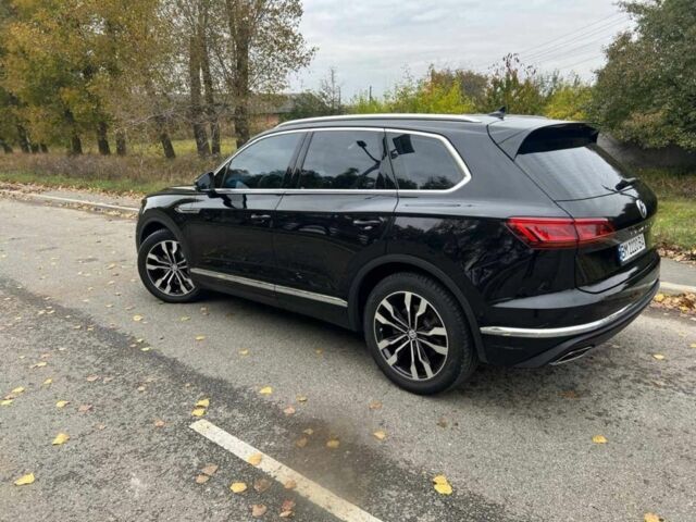 Белый Фольксваген Туарег, объемом двигателя 3 л и пробегом 125 тыс. км за 47500 $, фото 3 на Automoto.ua