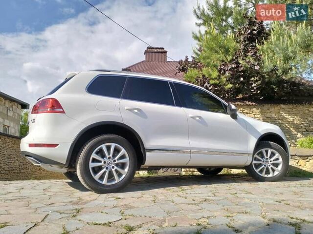 Білий Фольксваген Туарег, об'ємом двигуна 3 л та пробігом 241 тис. км за 21800 $, фото 32 на Automoto.ua