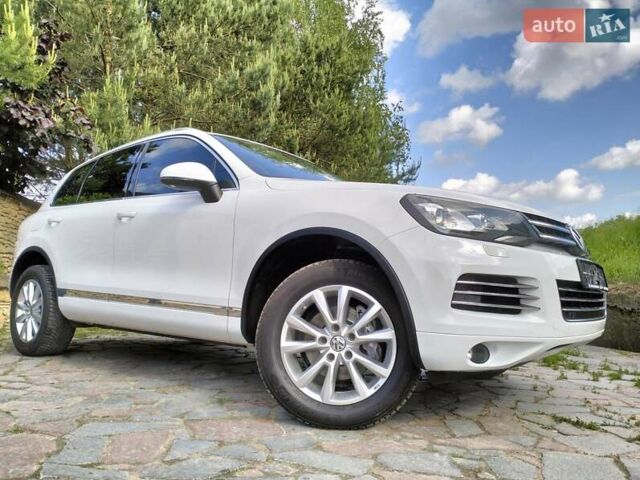 Білий Фольксваген Туарег, об'ємом двигуна 3 л та пробігом 241 тис. км за 21800 $, фото 28 на Automoto.ua