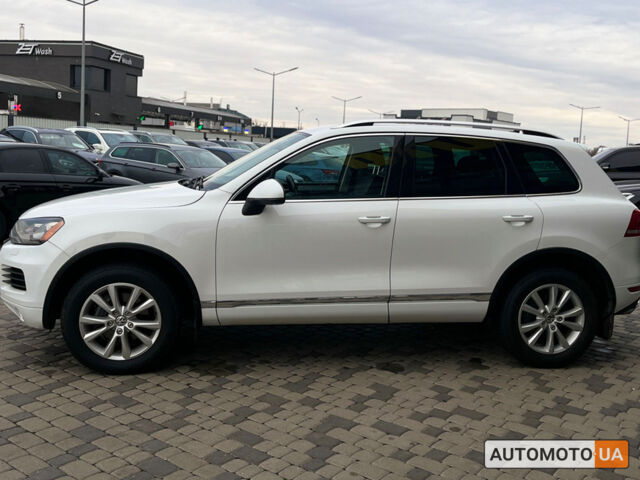 Білий Фольксваген Туарег, об'ємом двигуна 3 л та пробігом 283 тис. км за 20800 $, фото 3 на Automoto.ua