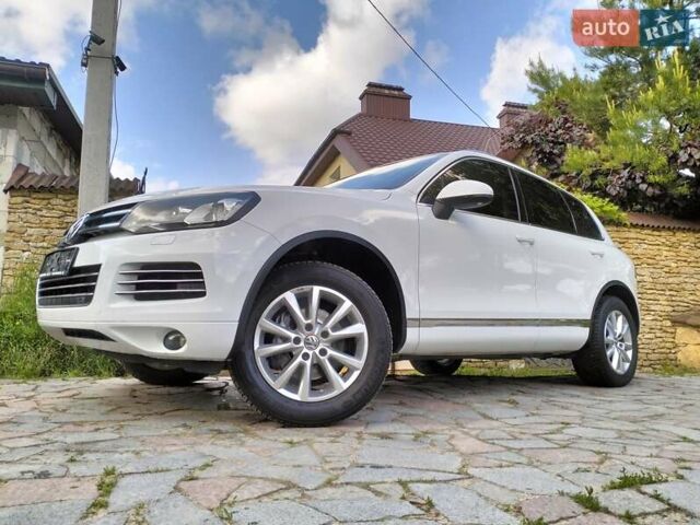 Білий Фольксваген Туарег, об'ємом двигуна 3 л та пробігом 241 тис. км за 21800 $, фото 26 на Automoto.ua