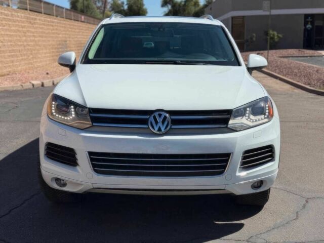 Белый Фольксваген Туарег, объемом двигателя 3 л и пробегом 83 тыс. км за 10500 $, фото 1 на Automoto.ua