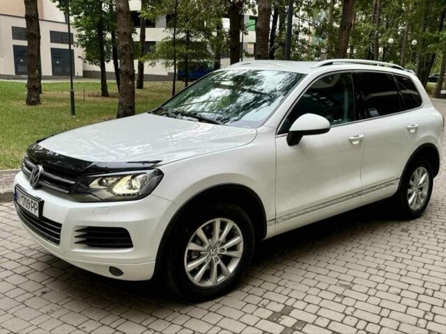 Белый Фольксваген Туарег, объемом двигателя 3 л и пробегом 291 тыс. км за 15900 $, фото 1 на Automoto.ua