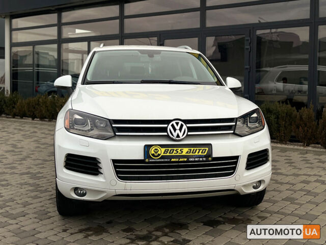 Білий Фольксваген Туарег, об'ємом двигуна 3 л та пробігом 283 тис. км за 20800 $, фото 1 на Automoto.ua