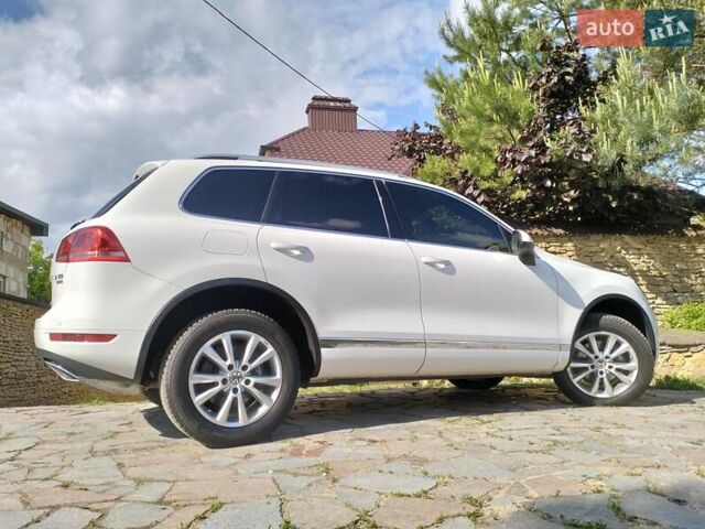 Білий Фольксваген Туарег, об'ємом двигуна 3 л та пробігом 241 тис. км за 21800 $, фото 29 на Automoto.ua