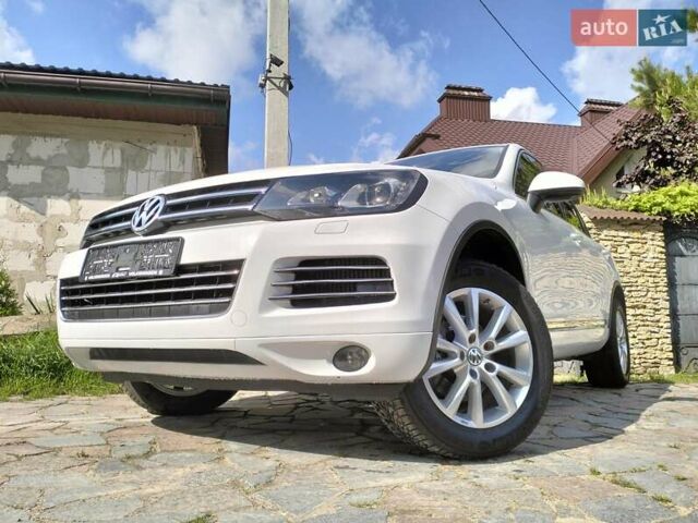 Білий Фольксваген Туарег, об'ємом двигуна 3 л та пробігом 241 тис. км за 21800 $, фото 24 на Automoto.ua