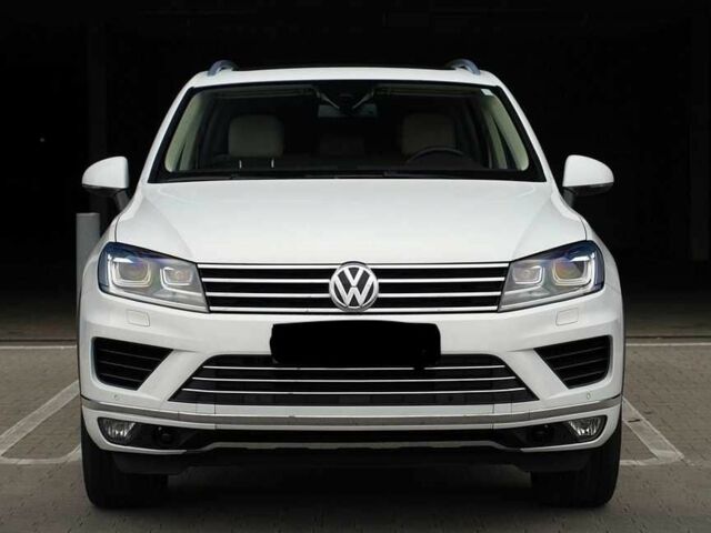 Белый Фольксваген Туарег, объемом двигателя 3 л и пробегом 103 тыс. км за 11900 $, фото 1 на Automoto.ua