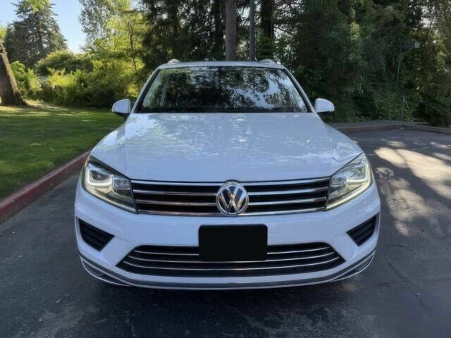 Белый Фольксваген Туарег, объемом двигателя 3.6 л и пробегом 70 тыс. км за 3800 $, фото 1 на Automoto.ua