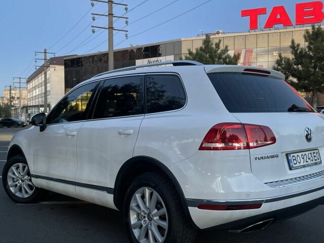 Белый Фольксваген Туарег, объемом двигателя 3 л и пробегом 208 тыс. км за 21800 $, фото 1 на Automoto.ua