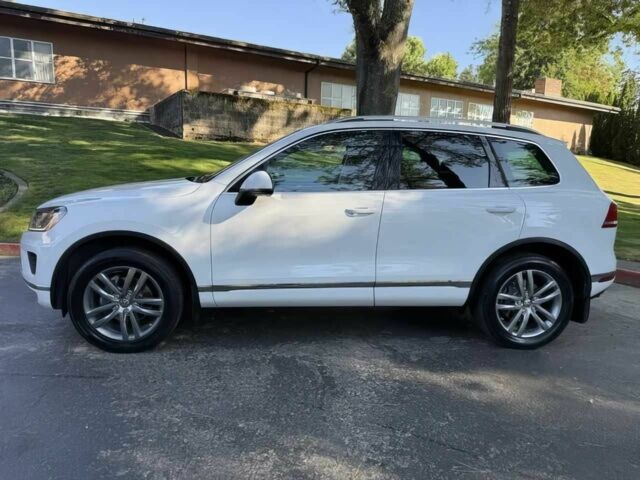 Белый Фольксваген Туарег, объемом двигателя 3.6 л и пробегом 77 тыс. км за 13700 $, фото 3 на Automoto.ua